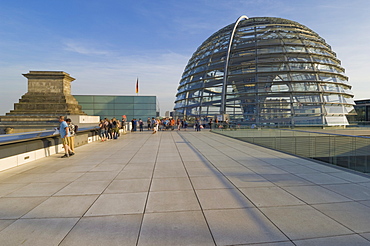 Tourists on the roof terrace of the famous Reichstag Parliament Building reconstructed by architect Sir Norman Foster between 1994 and 1999 with its famous glass cupola, Berlin, Germany, Europe