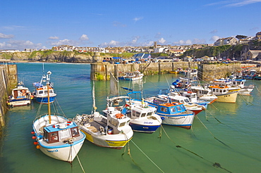 Small fishing boats in the harbour at high tide, Newquay, North Cornwall, England, United Kingdom, Europe