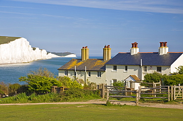 View of The Seven Sisters cliffs, the coastguard cottages on Seaford Head, South Downs Way, South Downs National Park, East Sussex, England, United Kingdom, Europe