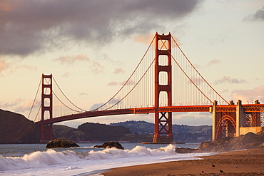 The Golden Gate Bridge, linking the city of San Francisco with Marin County, taken from Baker Beach at sunset and high tide, San Francisco, California, United States of America, North America