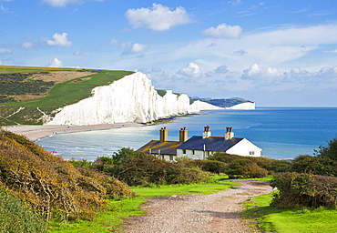 The Seven Sisters chalk cliffs and coastguard cottages, South Downs Way, South Downs National Park, East Sussex, England, United Kingdom, Europe