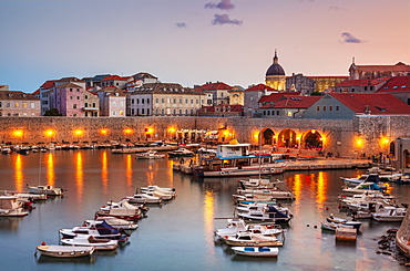 Fishing boats at sunset in the Old Port, Dubrovnik Old Town, Dalmatian Coast, Dubrovnik, Croatia, EU, Europe