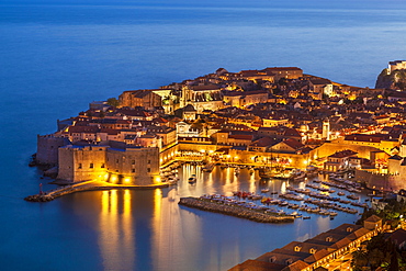 Aerial view of Old Port and Dubrovnik Old Town at night, UNESCO World Heritage Site, Dubrovnik, Dalmatian Coast, Croatia, Europe