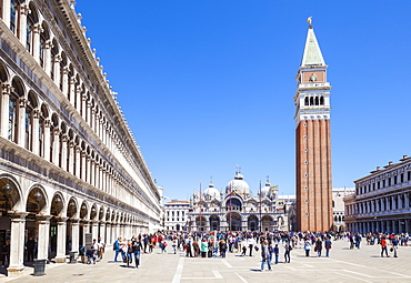 Campanile tower, Piazza San Marco (St. Marks Square) with tourists and Basilica di San Marco, Venice, UNESCO World Heritage Site, Veneto, Italy, Europe