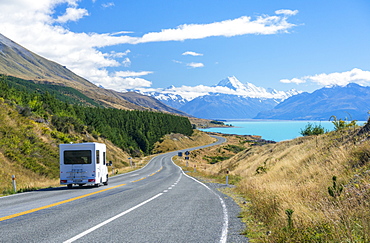 Motorhome (camper van) on a winding road to Mount Cook, Mount Cook National Park, Lake Pukaki, UNESCO World Heritage Site, South Island, New Zealand, Pacific