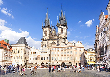 The Church of Our Lady Before Tyn in the busy Old Town Square (Staromestske namesti), UNESCO World Heritage Site, Prague, Czech Republic, Europe