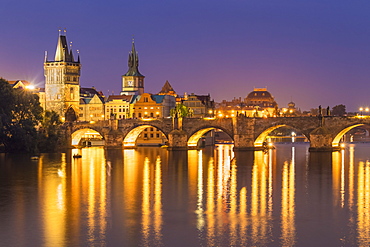 Prague Charles bridge, Old town bridge tower and river Vltava at night, UNESCO World Heritage Site, Prague, Czech Republic, Europe