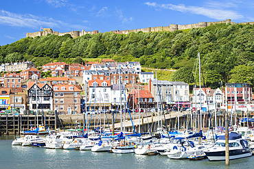 Scarborough harbour, marina and castle in south bay, Scarborough, North Yorkshire, England, United Kingdom, Europe