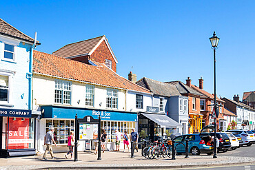 Aldeburgh High Street with people browsing through small shops, Aldeburgh, Suffolk, England, United Kingdom, Europe