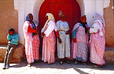 Berber women talking in the shade, Ouarzazate