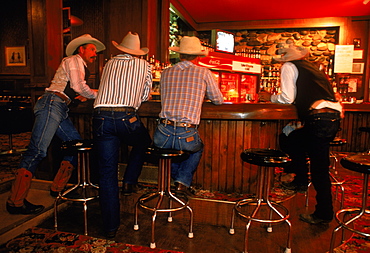 Cowboys in Colorado bar, USA