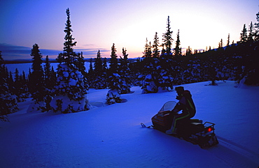 Snowmobile at twilight, Mount Otish