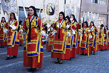 Women carrying banners and candles, Corpus Domini procession, Desulo (Gennargentu), Sardinia, Italy, Europe