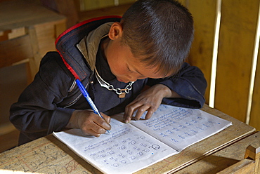 Black Hmong ethnic group boy at school, Sapa area, Vietnam, Indochina, Southeast Asia, Asia