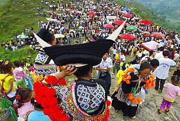 Long Horn Miao girls in traditional costumes celebrating summer Festival, around Zhijian, Guizhou Province, China, Asia 