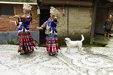 Miao girls in traditional costume and silver headdresses, Skirt Miao, Xijiang village, Guizhou Province, China, Asia