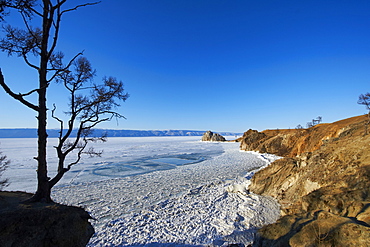 Shaman rock, Maloe More (Little Sea), frozen lake during winter, Olkhon island, Lake Baikal, UNESCO World Heritage Site, Irkutsk Oblast, Siberia, Russia, Eurasia 