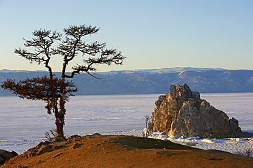 Shaman rock, Maloe More (Little Sea), frozen lake during winter, Olkhon island, Lake Baikal, UNESCO World Heritage Site, Irkutsk Oblast, Siberia, Russia, Eurasia 