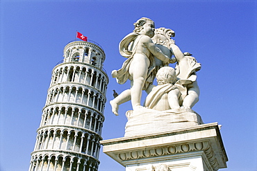 Statue in front of the Leaning Tower of Pisa, Campo dei Miracoli (Place des Miracles), UNESCO World Heritage Site, Pisa, Tuscany, Italy, Europe