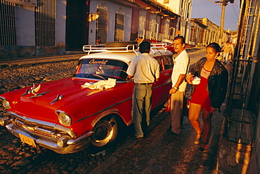 Street scene with old car, Trinidad, Cuba, West Indies, Central America