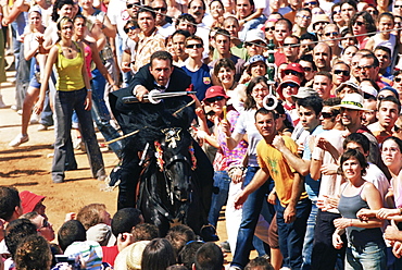 Rider speeding during the Medieval games, festival celebrated on St. John's Day (Festa de Sant Joan), Ciutadella, Minorca (Menorca), Balearic Islands, Spain, Mediterranean, Europe
