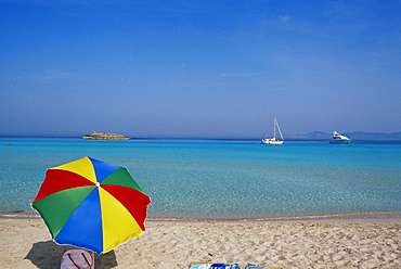 Colourful umbrella on Playa de ses Illetes beach, Formentera, Balearic Islands, Spain, Mediterranean, Europe