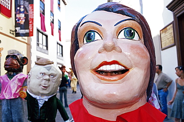 Giant masks on parade during celebration of Descent of Our Lady of Snows fiesta, Santa Cruz de la Palma, La Palma, Canary Islands, Spain, Atlantic, Europe