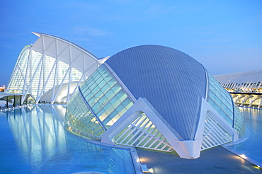 Hemisferic (Planetarium) with the Principe Felipe Science Museum beyond at dusk, architect Santiago Calatrava, City of Arts and Sciences, Valencia, Spain, Europe