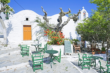 Streetside cafe tables and chairs, Amorgos, Cyclades Islands, Greek Islands, Greece, Europe