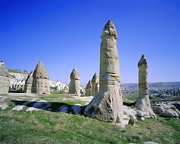 Rock formations resulting from differential erosion, Goreme Valley, Cappadocia, Turkey, Eurasia