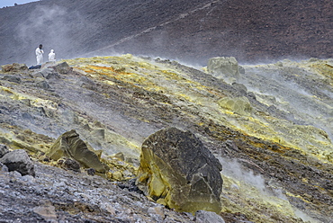 Geologists taking mineral samples on Gran Cratere (The Great Crater), Vulcano Island, Aeolian Islands, UNESCO World Heritage Site, Sicily, Italy, Mediterranean, Europe