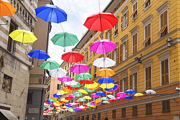 Brightly coloured floating umbrellas, Genoa, Liguria, Italy, Europe