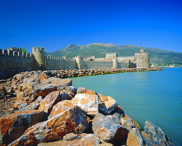 Walls and towers of 'Mamure Kalesi' touching the Meditteranean Sea, Anamur, Turkey 