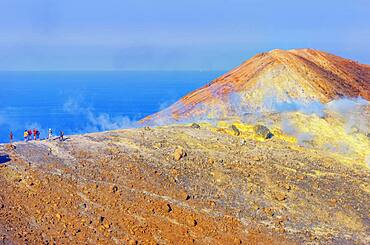 People walking on Gran Cratere rim, Vulcano Island, Aeolian Islands, UNESCO World Heritage Site, Sicily, Italy, Mediterranean, Europe