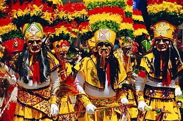 A group of Tobas performing the Devil Dance - La Diablada, during the carnival, Oruro, Bolivia, South America