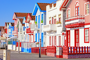 Brightly painted beach homes, Costa Nova do Prado, Aveiro, Portugal, Europe