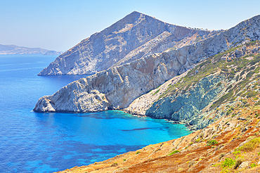 View of Folegandros Island multicolored rocks coastline, Chora, Folegandros Island, Cyclades Islands, Greece