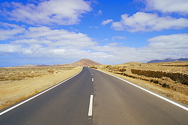 Road through volcanic landscape near Tiscamanita, Fuerteventura, Canary Islands, Spain, Atlantic, Europe