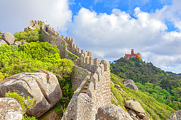 View of Castelo dos Mouros and Pena Palace in the distance, Sintra, Portugal