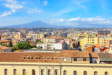 Elevated view of the town with Etna volcano in the distance, Catania, Sicily, Italy