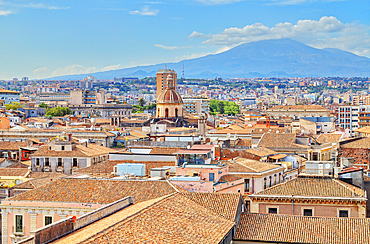 Elevated view of the town with Etna volcano in the distance, Catania, Sicily, Italy