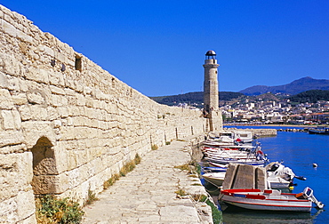 View of old Venetian Rethymo's lighthouse, wall and harbours, Rethymno (Rethymnon), island of Crete, Greece, Mediterraneann, Europe