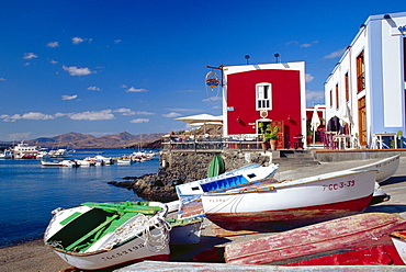 Boats and old red house, Old Port, Puerto del Carmen, Lanzarote, Canary Islands, Spain 