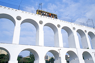 Santa Teresa Bondinho (tram) travelling over a bridge, Rio de Janeiro, Brazil, South America