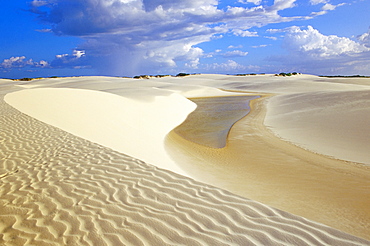 Sandy dunes near Lagoa Bonita (Beautiful lagoon) at Parque Nacional dos Lencois Maranhenses, Brazil, South America