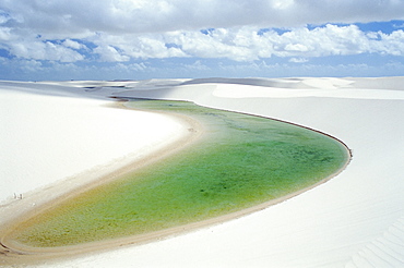 Small lagoon and sandy dunes, Parque Nacional dos Lencois Maranhenses, Brazil, South America