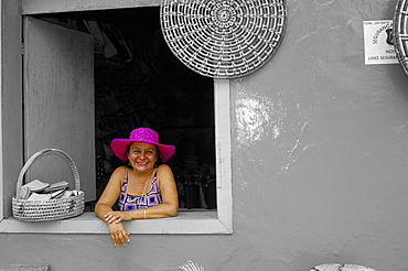 Hat seller at the window of her shop, Parque Nacional dos Lencois Maranhenses, Brazil, South America