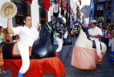 Wooden horses on parade during the celebration of the Descent of Our Lady of Snows fiesta, Santa Cruz de la Palma, La Palma, Canary Islands, Spain, Atlantic, Europe