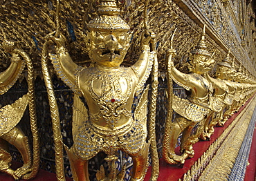 Garudas and nagas on external decorations of the Ubosoth, Wat Phra Kaew temple, Grand Palace, Bangkok, Thailand