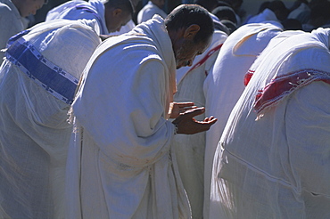 Christian men at prayer during Mass in the church at Woolisso, Gourague country, Shoa province, Ethiopia, Africa